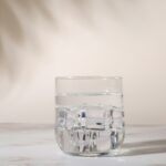 clear drinking glass on white table